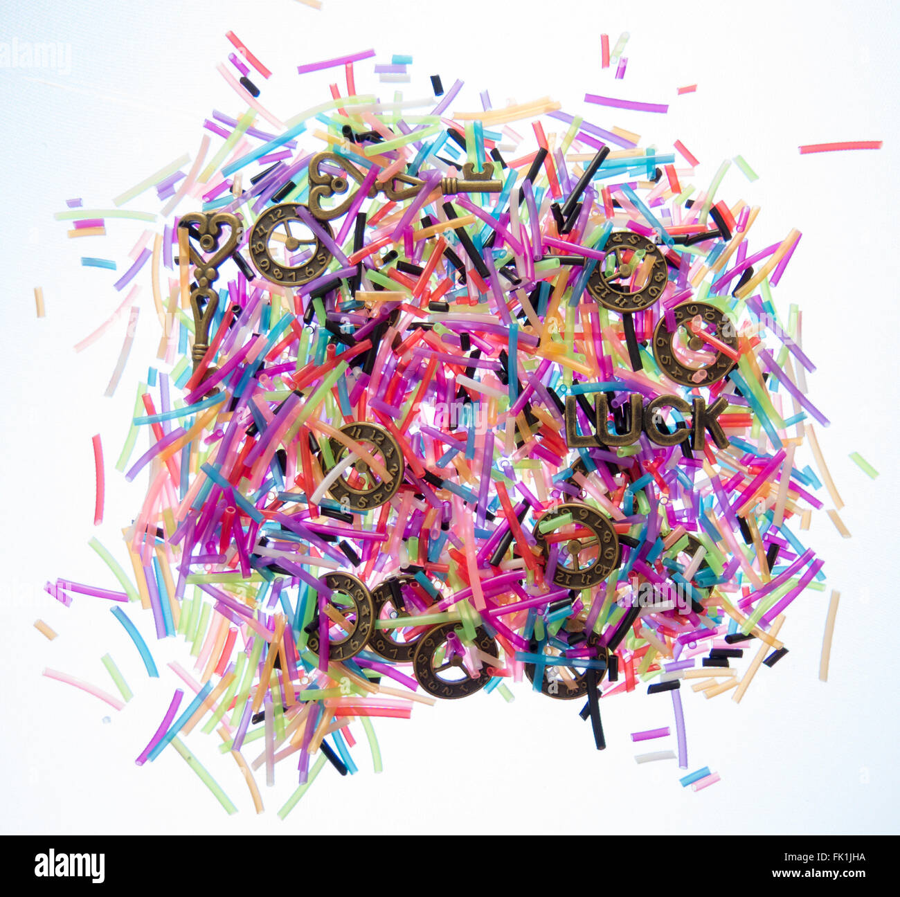 Background for cards of colored confetti hours with symbols, keys, and