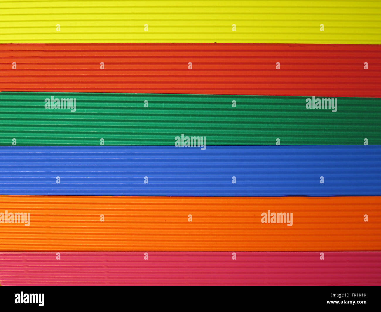 abstract color background, made of Corrugated multicolored line paper ...