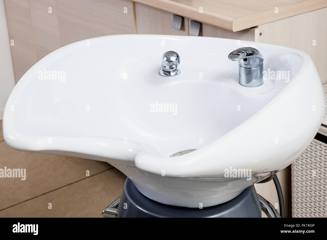 white sink in a modern barber shop Stock Photo Alamy
