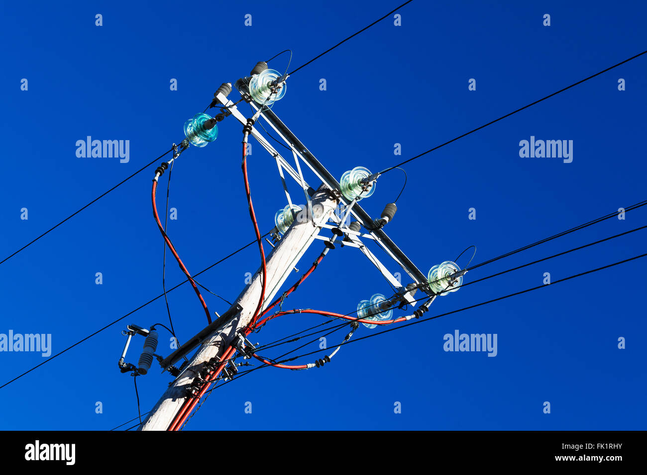pole with electrical wires in the sky Stock Photo - Alamy