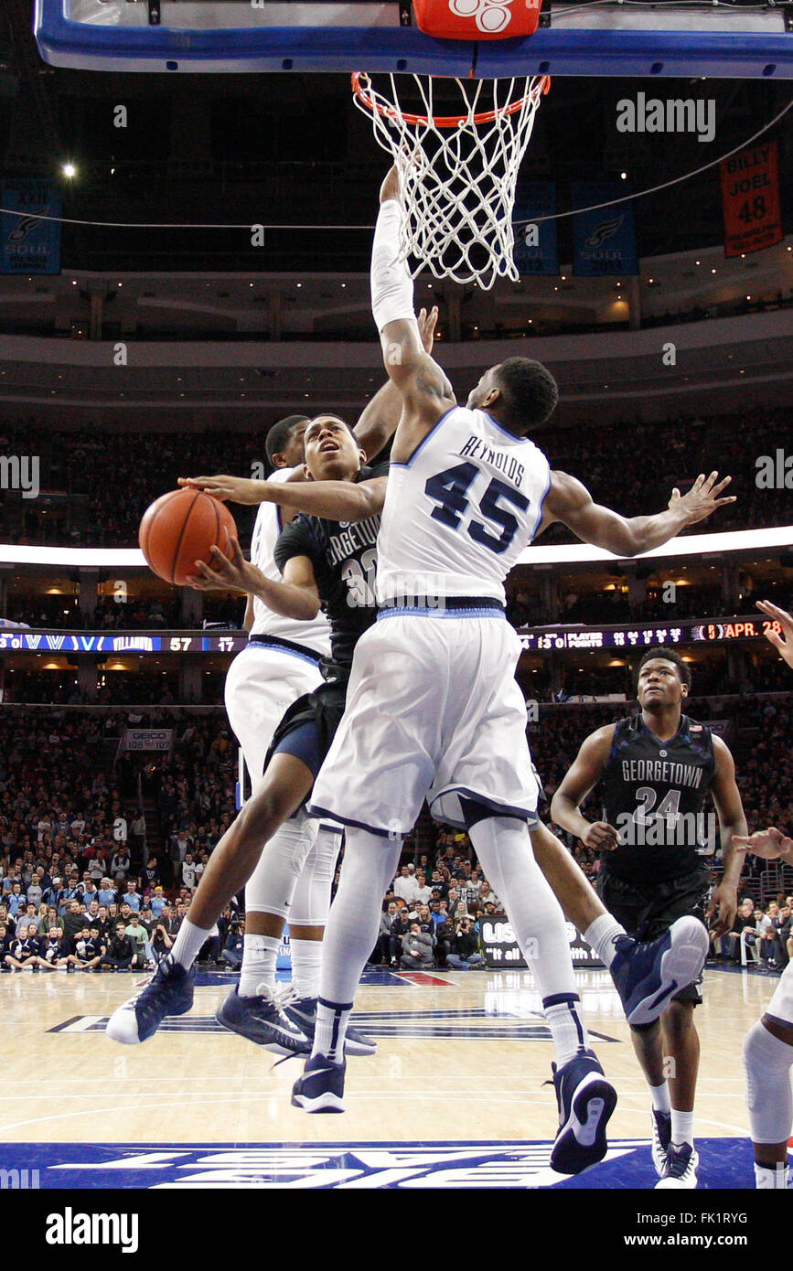 March 5, 2016 Hoyas guard Kaleb Johnson (32) tries to puts up the shot as he splits