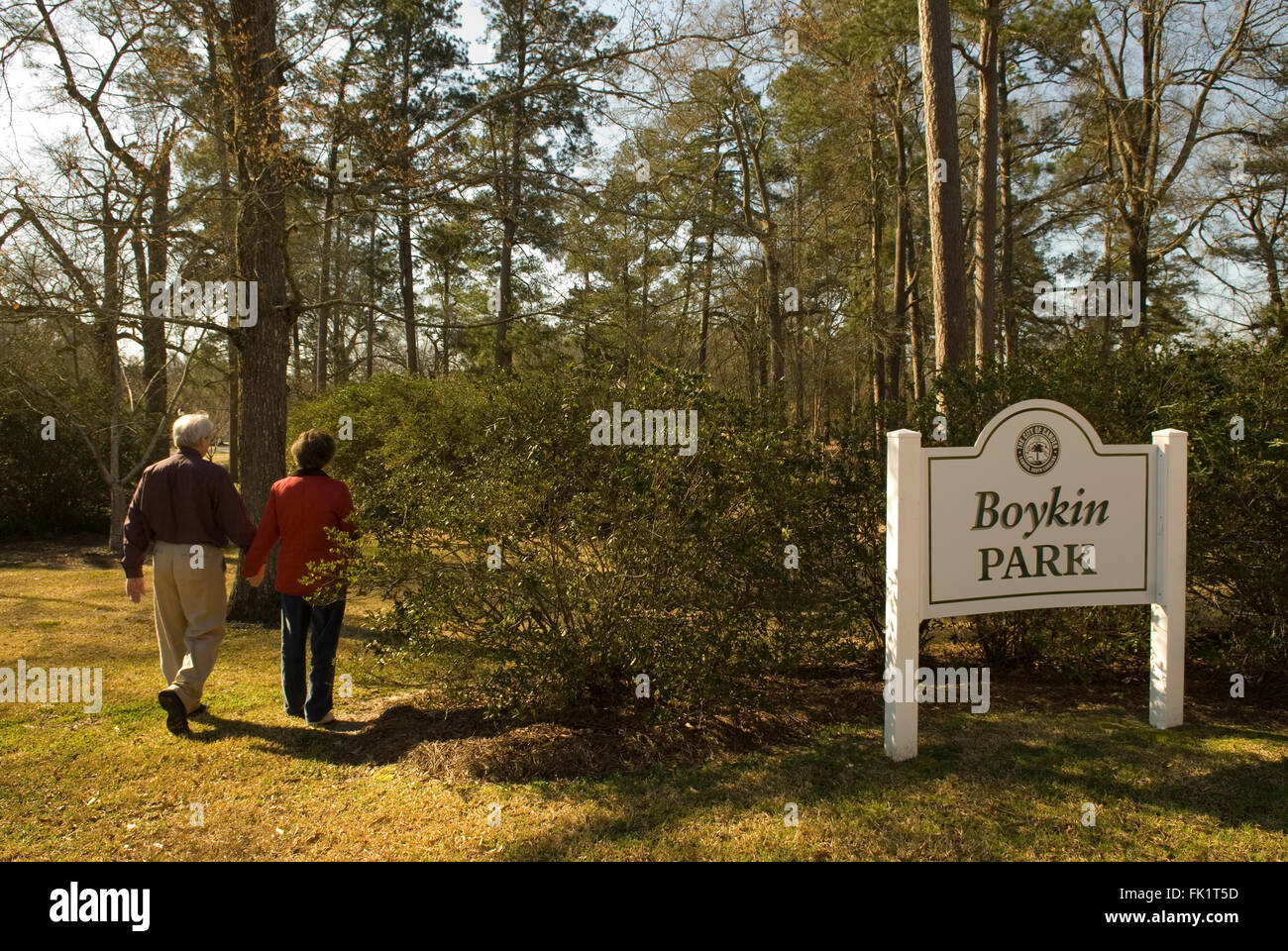 Caucasian couple entering Boykin Park Camden South Carolina USA Stock