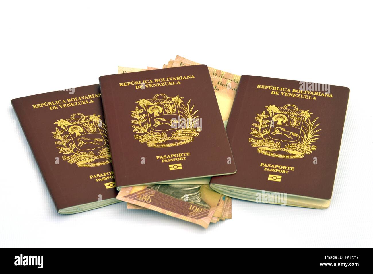 Venezuelan passports and bank notes Stock Photo