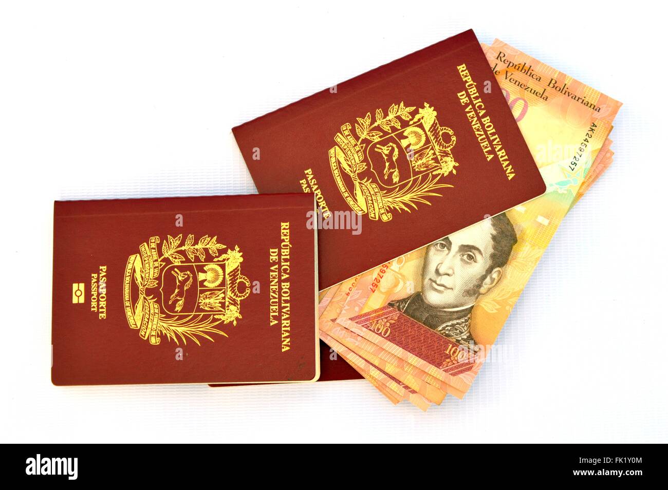 Venezuelan passports and bank notes. Stock Photo
