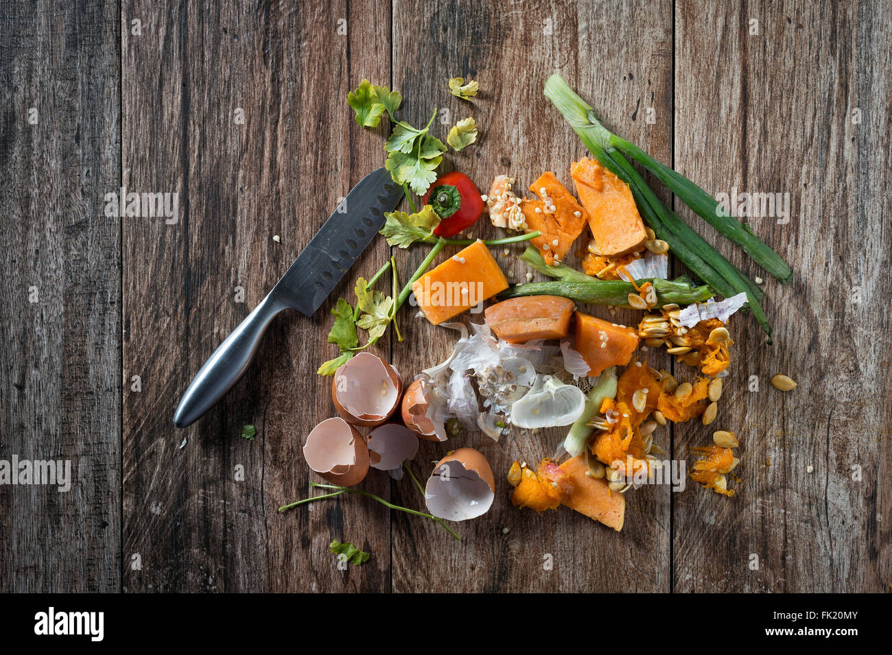 Organic leftovers, waste from vegetable ready for recycling and to compost. Collecting food leftovers for composting. Environmen Stock Photo