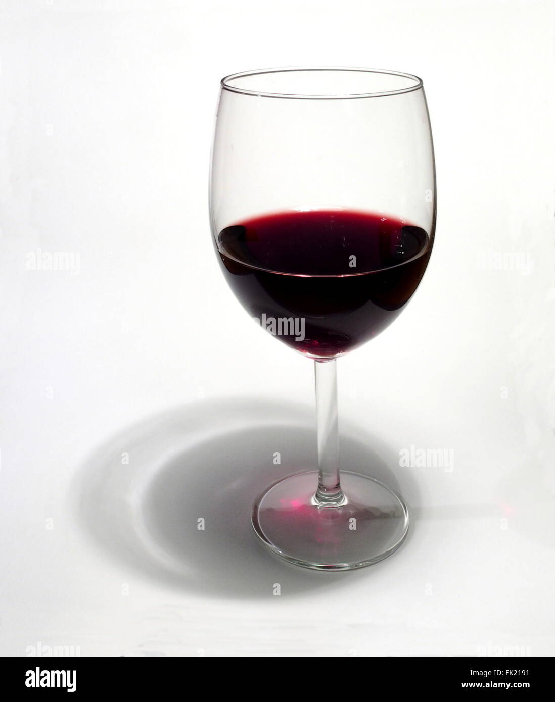 A glass of red wine with white background Stock Photo - Alamy