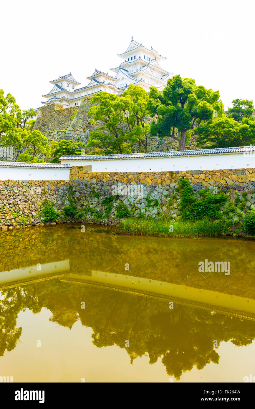 The water tank, sangoku moat, inside Himeji-jo castle complex on a sunny overcast day in Himeji, Japan after 2015 renovations fi Stock Photo