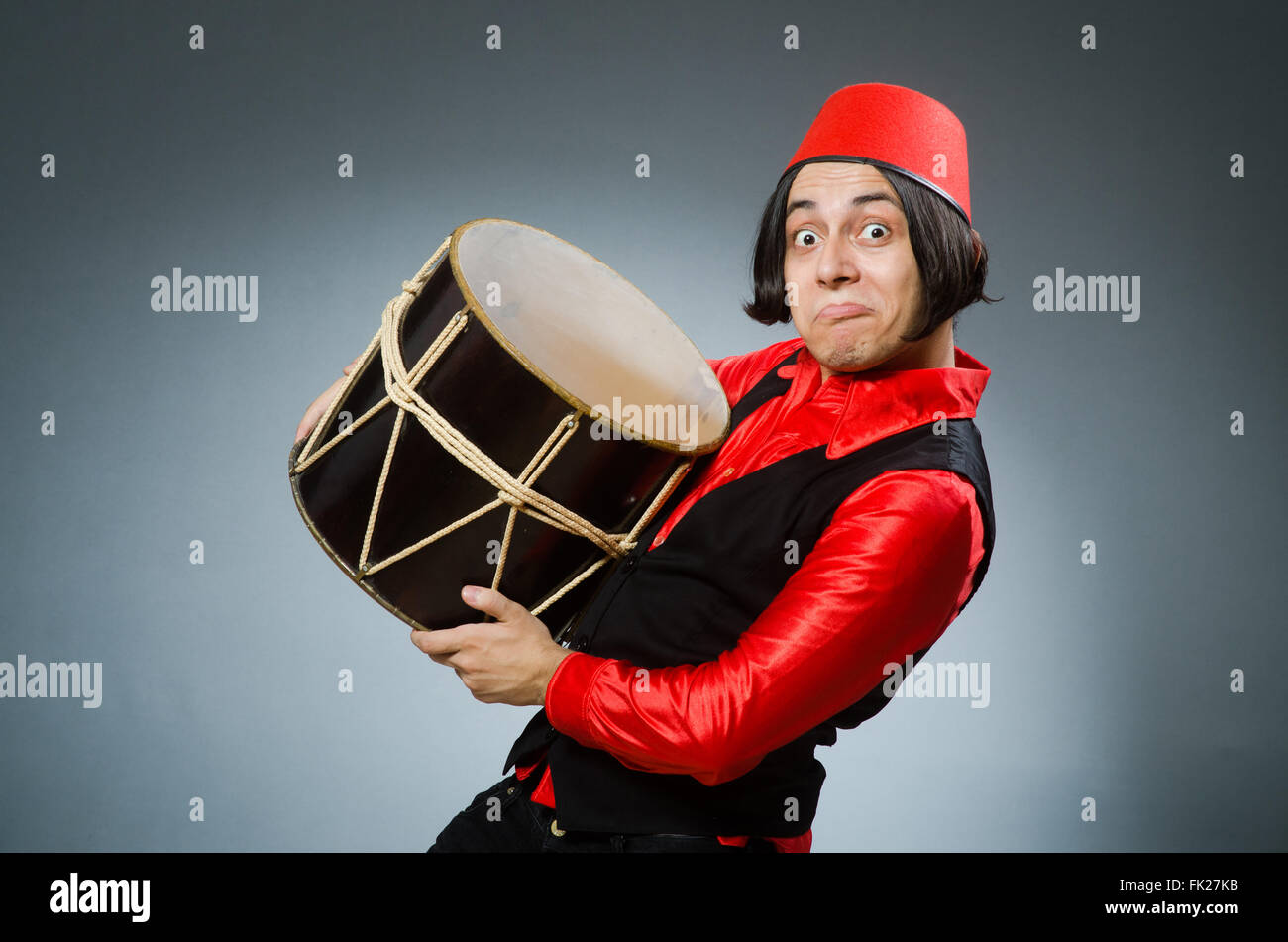 Man wearing red fez hat Stock Photo Alamy