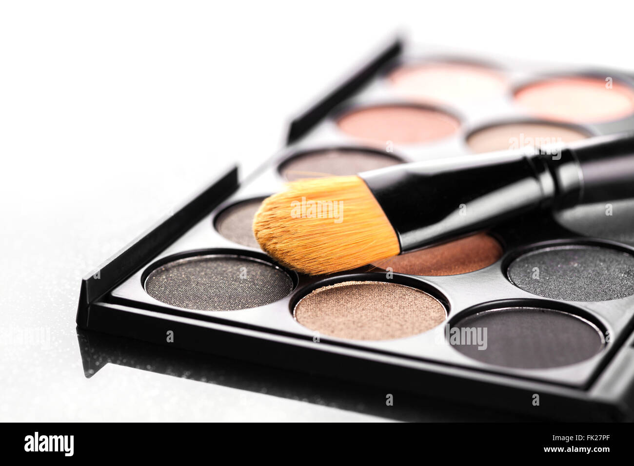 set of decorative cosmetics, Eyeshadow Palette and brush Stock Photo Alamy