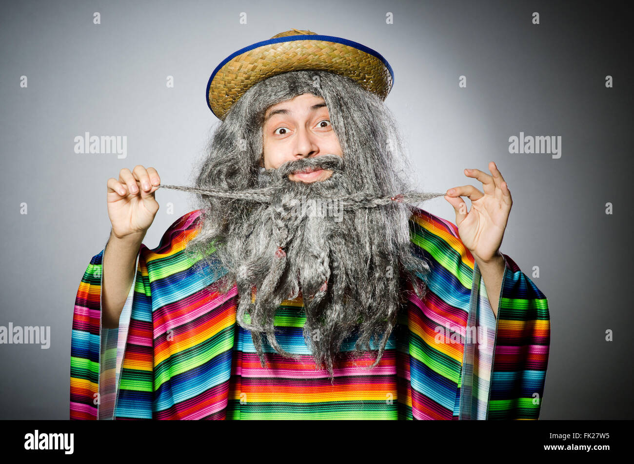 Person wearing sombrero hat in funny concept Stock Photo - Alamy