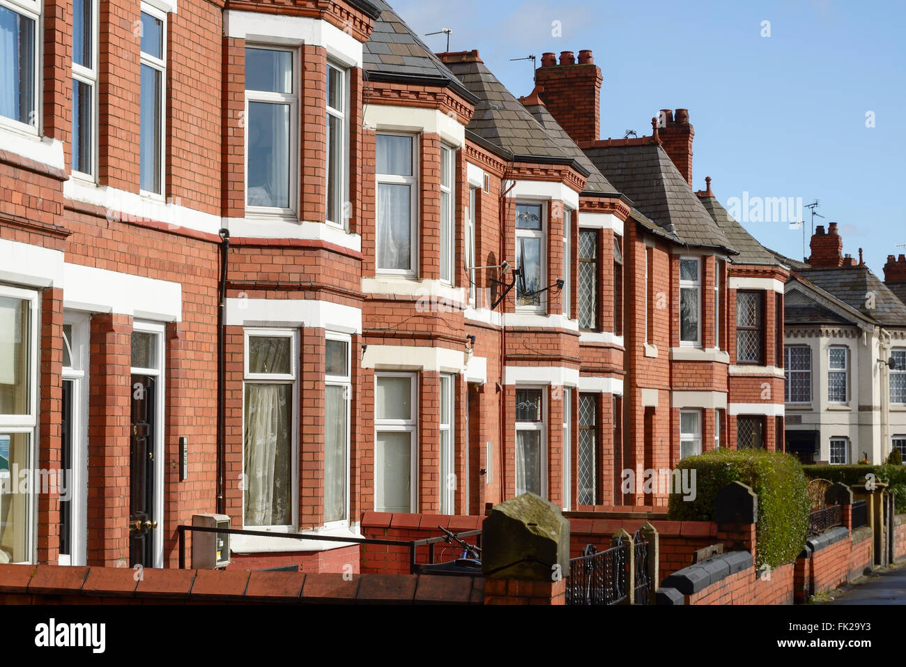 Row of bay fronted Victorian terraced houses Stock Photo