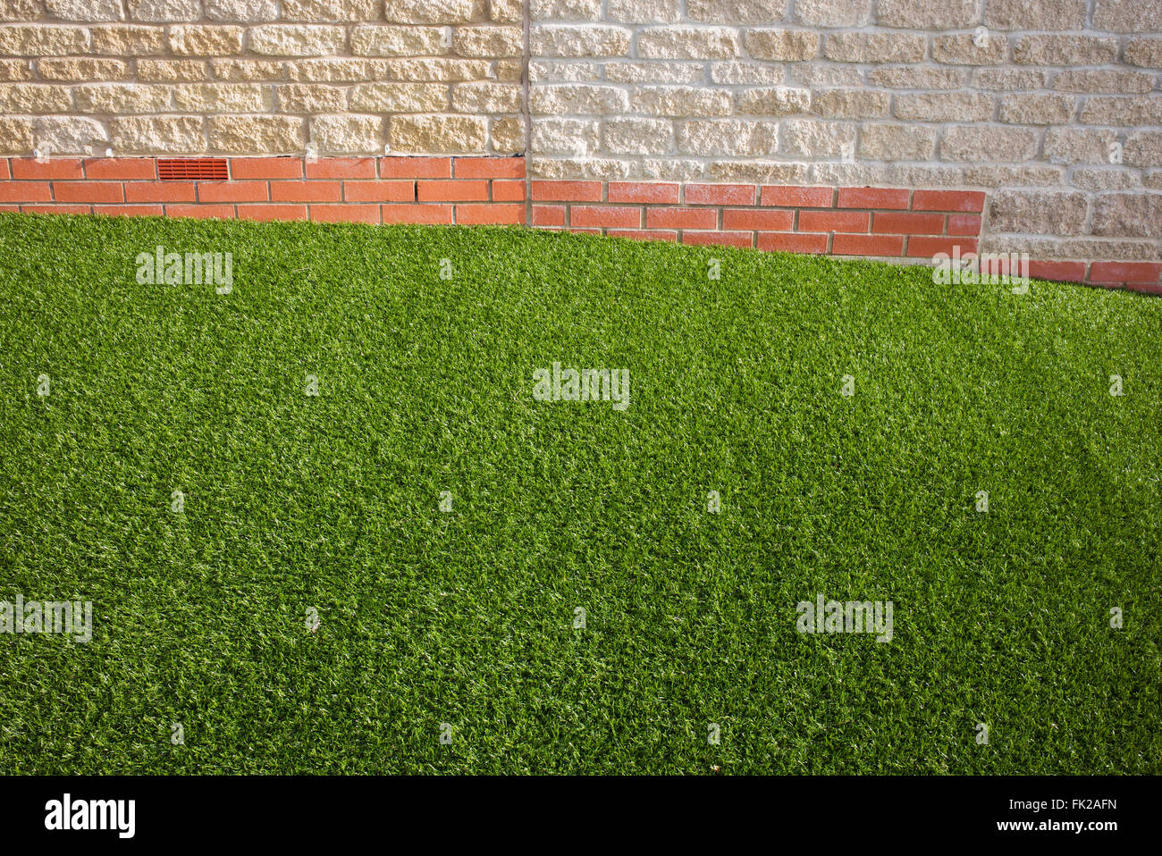 Artificial grass / astro turf on a new build housing estate. Bicester, Oxfordshire, England Stock Photo