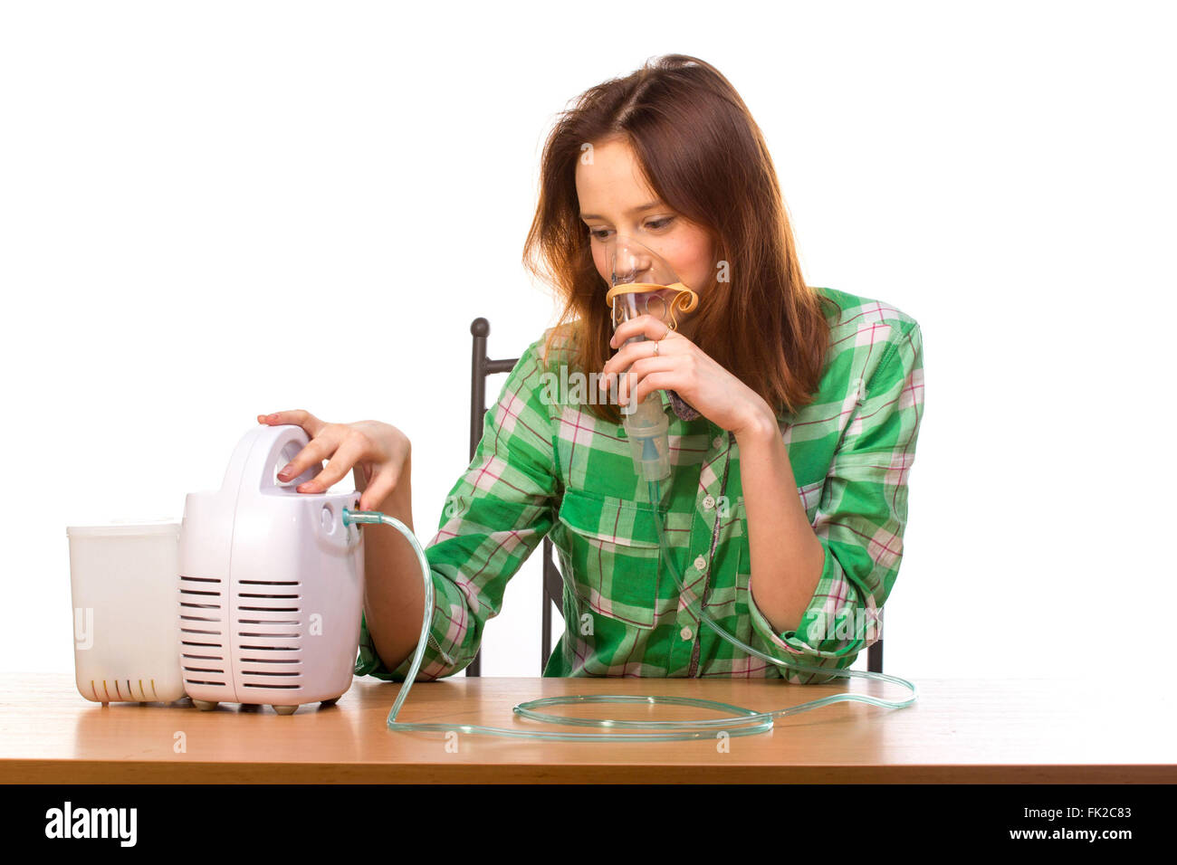 Young girl running nebulizer mask for respiratory inhaler Asthma