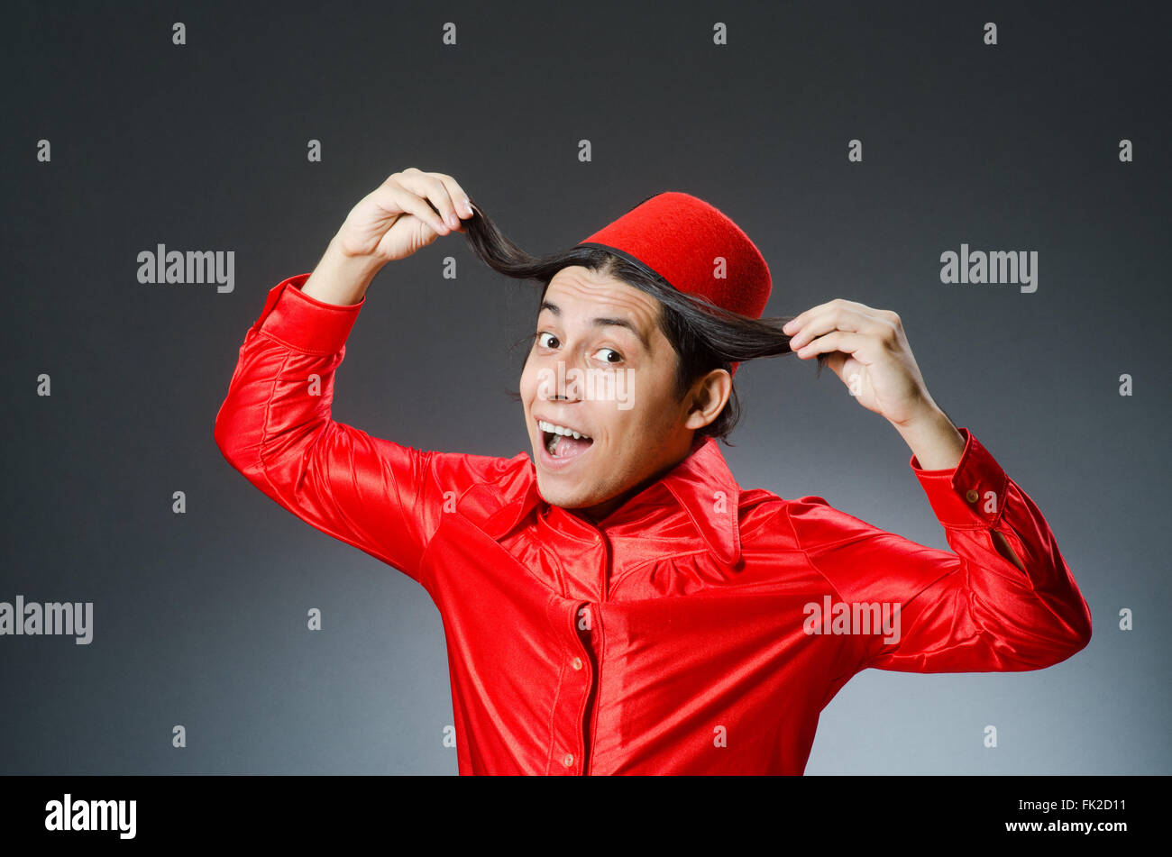 Man wearing red fez hat Stock Photo Alamy
