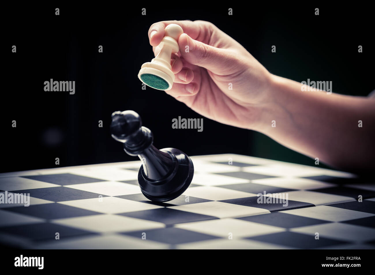 Hand moving chess piece chess hi-res stock photography and images - Alamy
