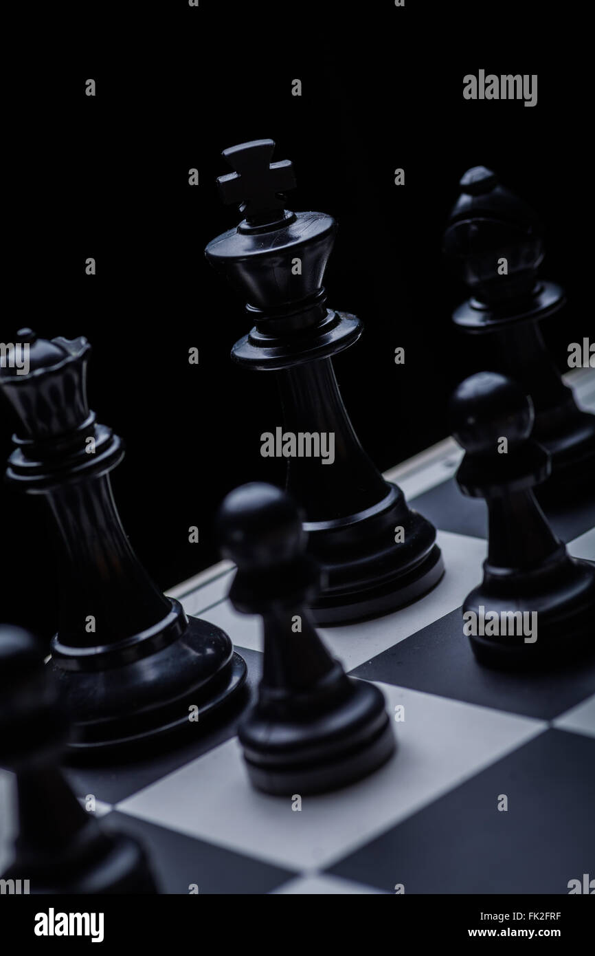 Close-up of chess game and chess pieces on table 4k from Pikwizard