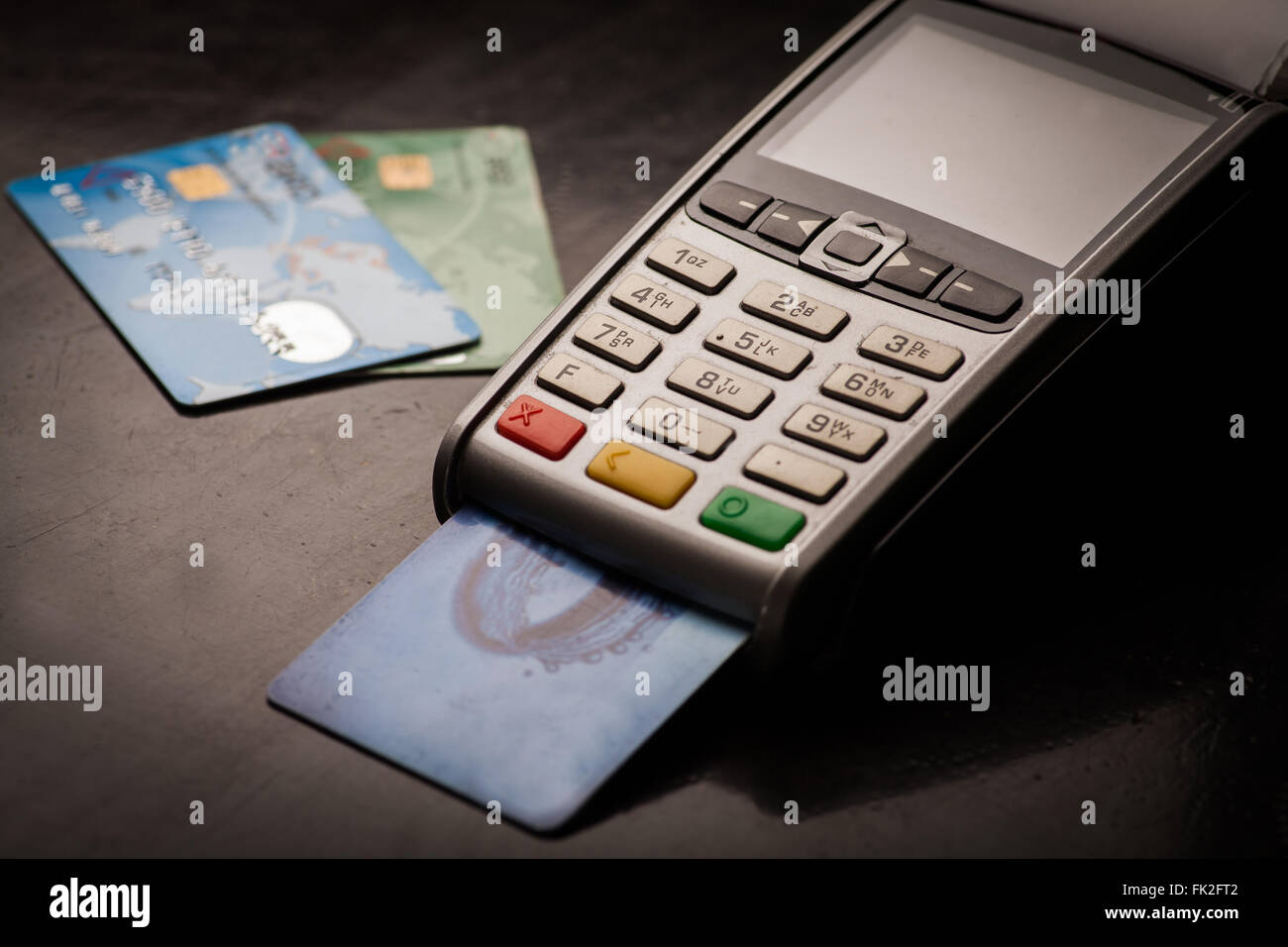Color image of a POS and credit cards Stock Photo - Alamy