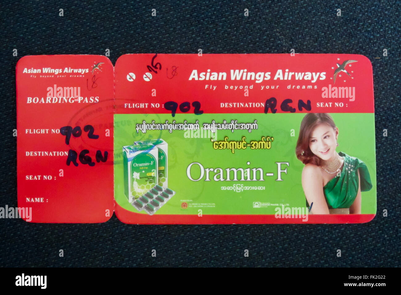 Hand-written boarding pass of Asian Wings Airways in Myanmar (Burma). Stock Photo