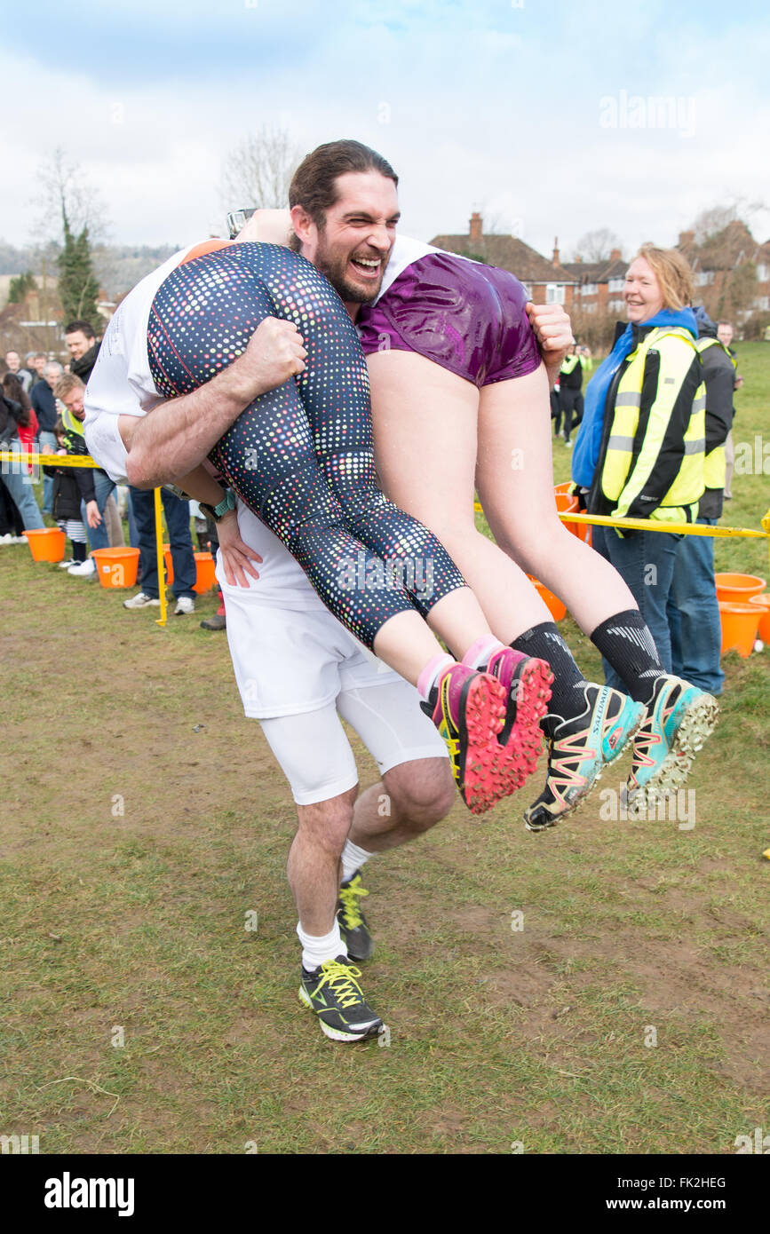 Wife carrying contest hires stock photography and images Alamy