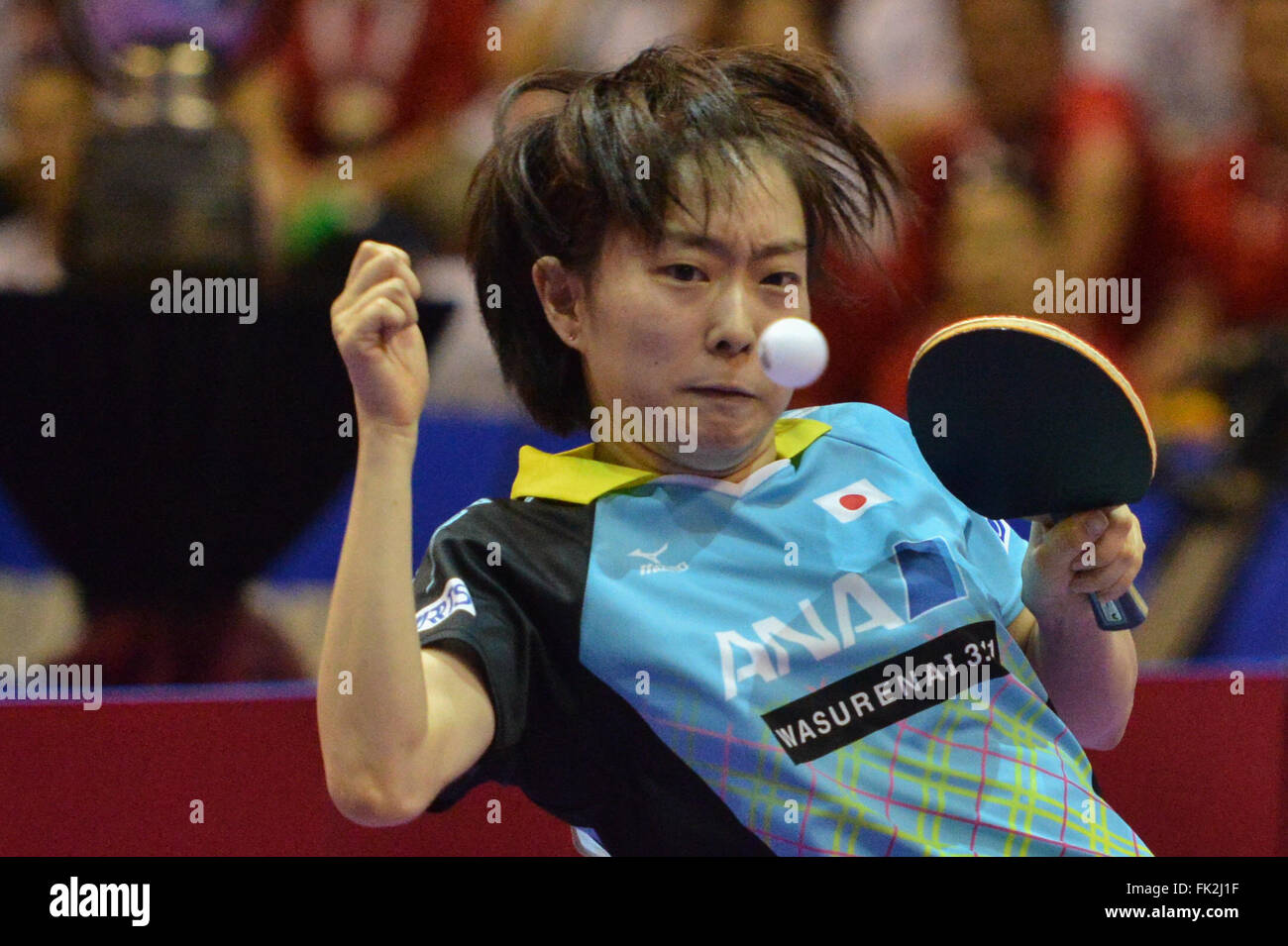 (160306) -- KUALA LUMPUR, March 6, 2016 (Xinhua) -- Kasumi Ishikawa of Japan's women's table tennis team competes during the final against China at the 2016 World Team Championships in Kuala Lumpur, Malaysia, March 6, 2016. Defending champion China's women's table tennis team won the world championship title for the 20th time by defeating Japan 3-0 in the final. (Xinhua/Chong Voon Chung) Stock Photo