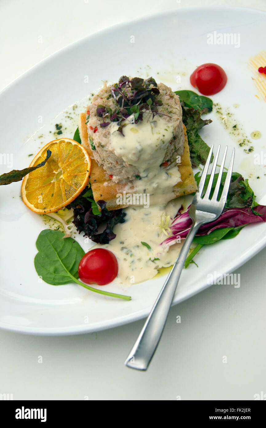 White crab salad.a UK crabs shellfish food foods restaurant restaurants salads plate plates dish dishes Stock Photo