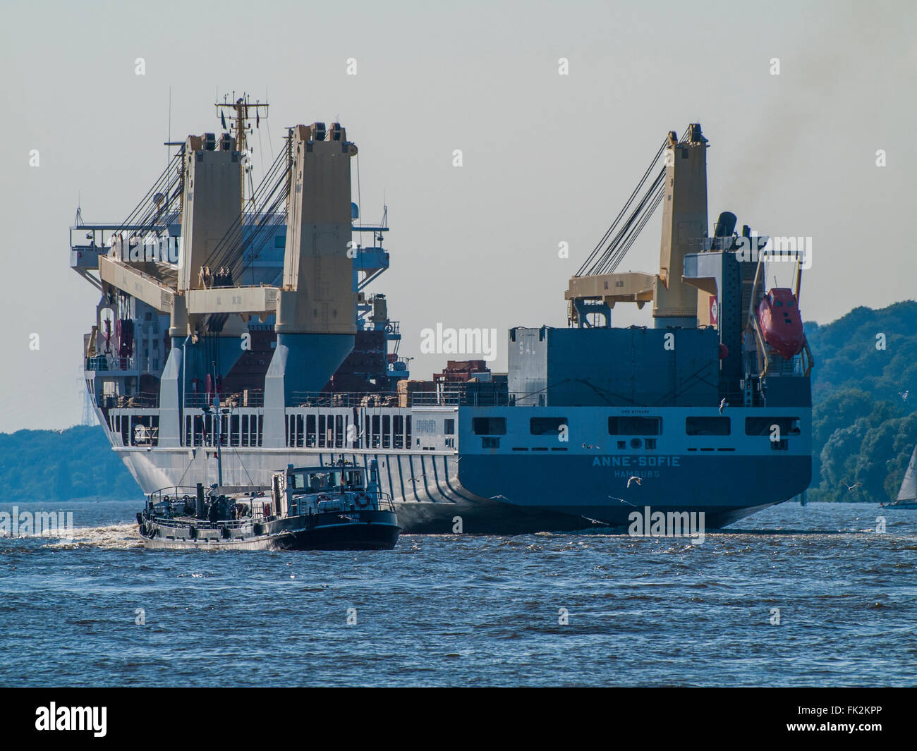 Multipurpose ship Anne-Sofie on the Elbe outbound from the Port of Hamburg, Germany. Stock Photo