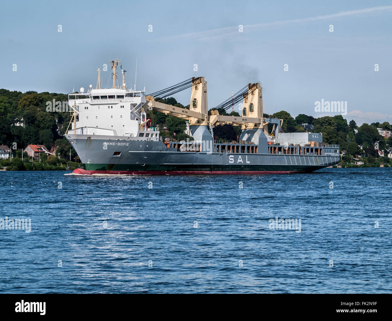 Multipurpose ship Anne-Sofie on the Elbe outbound from the Port of Hamburg, Germany. Stock Photo