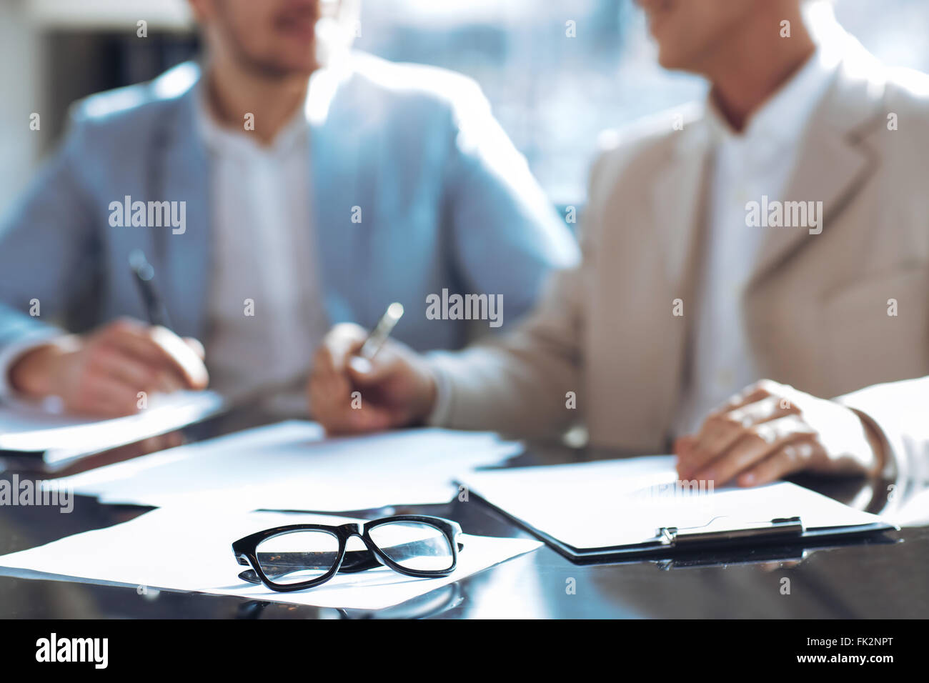 Glasses lying on the table Stock Photo - Alamy