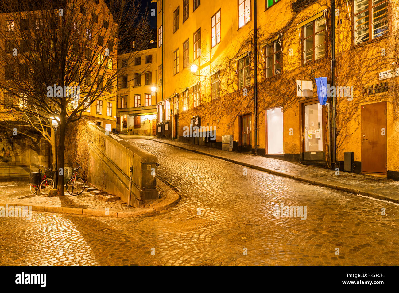 The junction of Österlånggatan, foreground, and sloped Köpmanbrinken (right) in Gamla Stan, the old town of Stockholm., Sweden Stock Photo