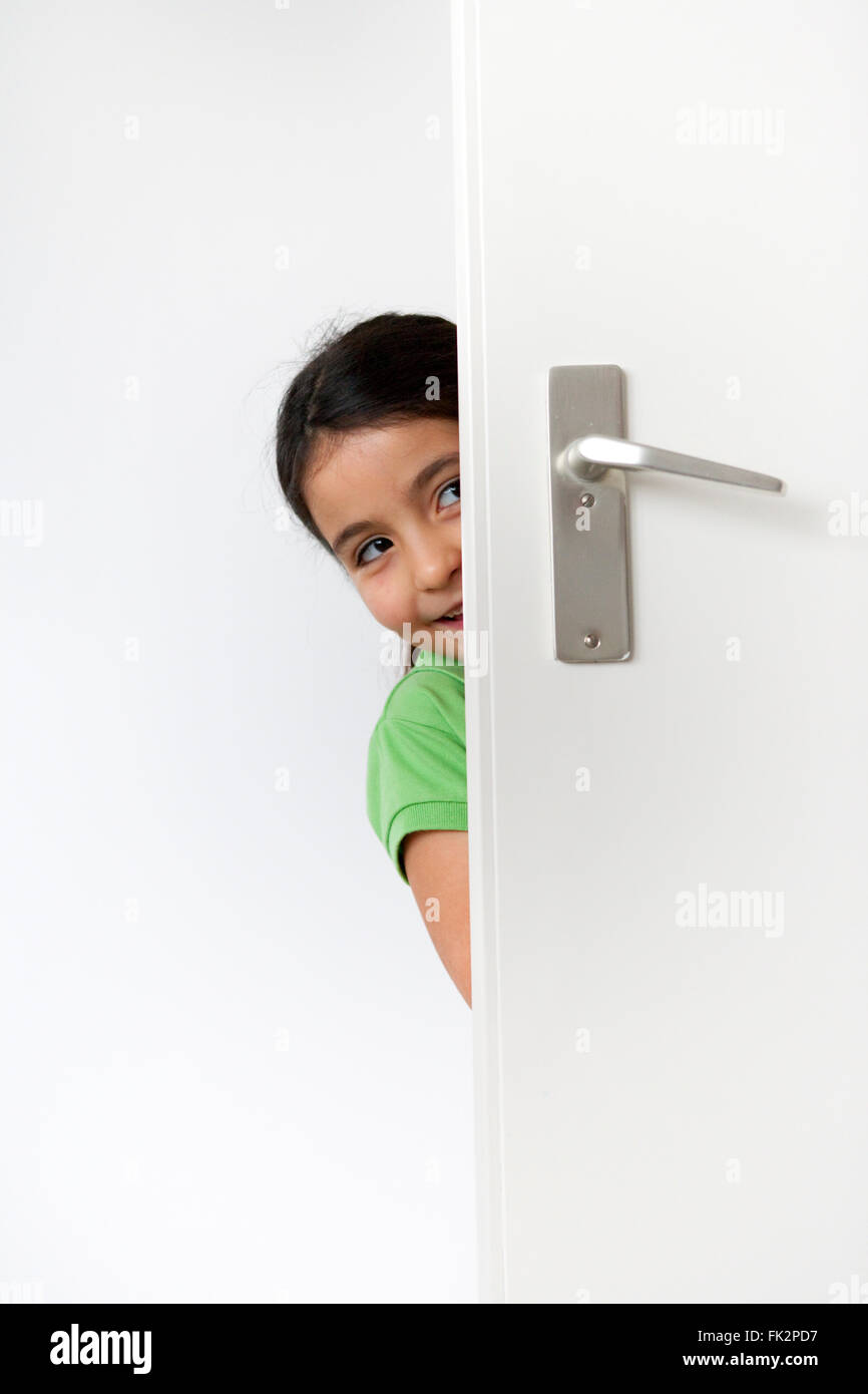 Child behind door hires stock photography and images Alamy