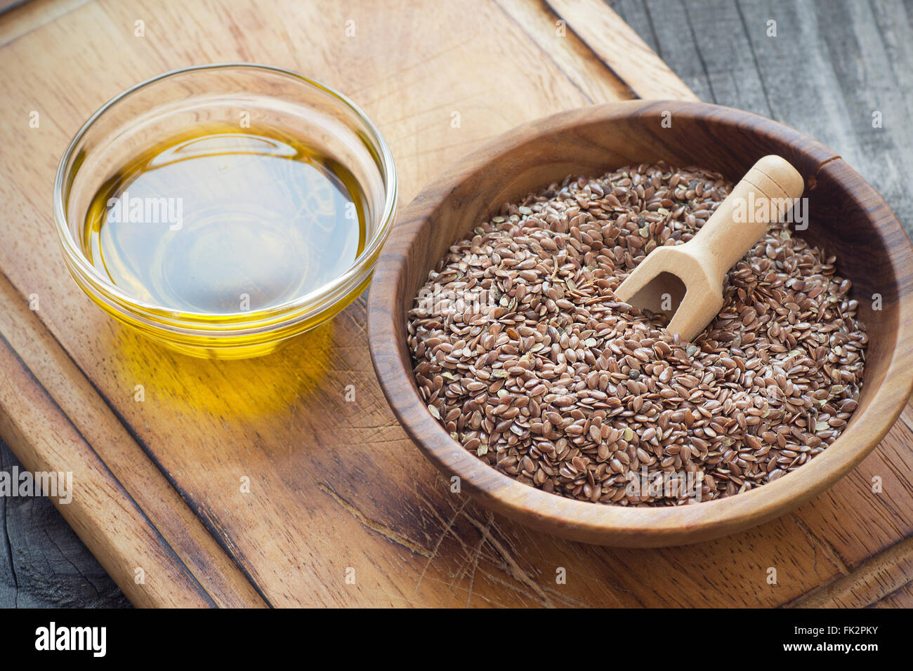 Brown flax seeds and flaxseed oil Stock Photo Alamy