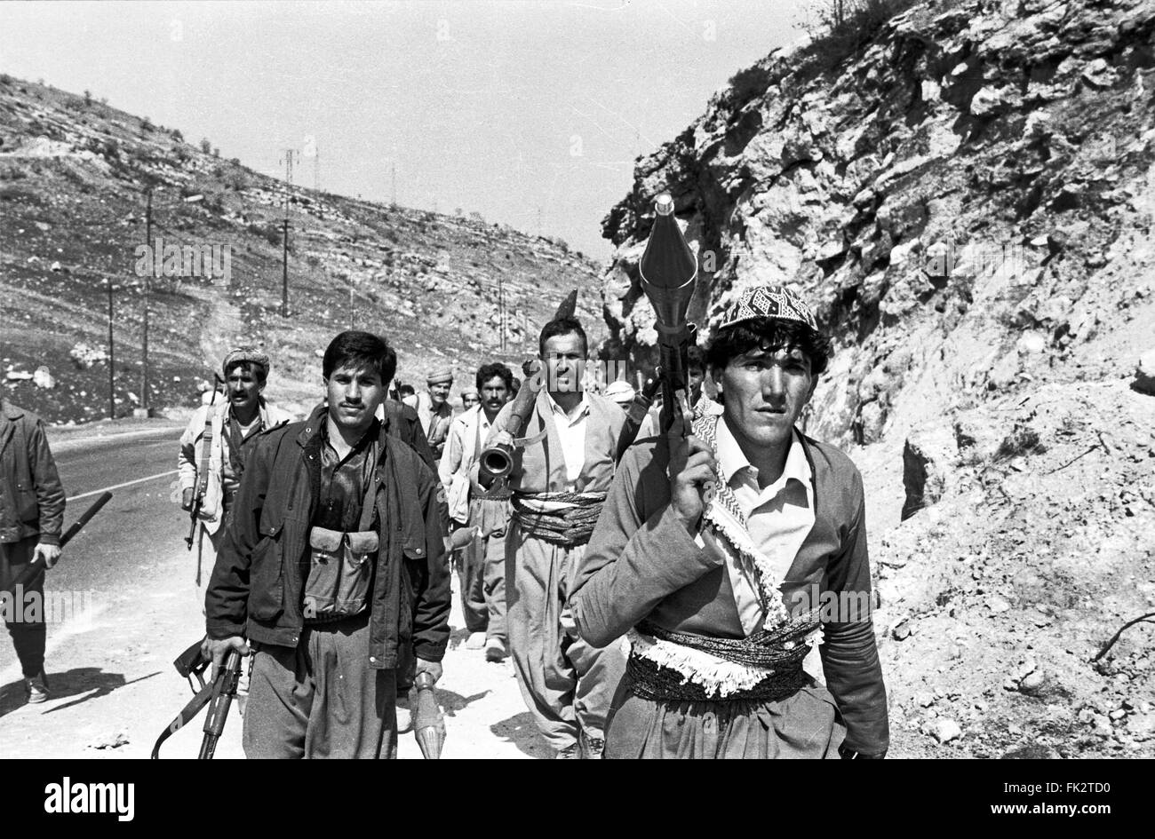 Near Zakho, northern Iraq, Kurdistan. March 1991. Fighters from the Kurdistan Front move to frontline positions to confront attacking Iraqi forces during the uprising by Kurds against forces of Saddam Hussein's government. Photo by:Richard Wayman Stock Photo