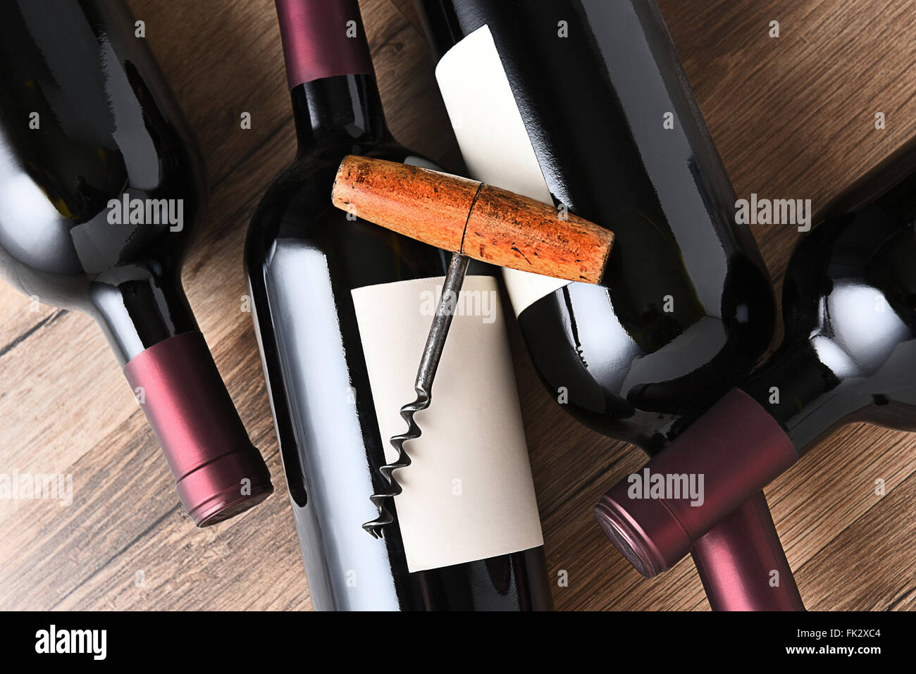 Top view of wine bottles and corkscrew. Stock Photo