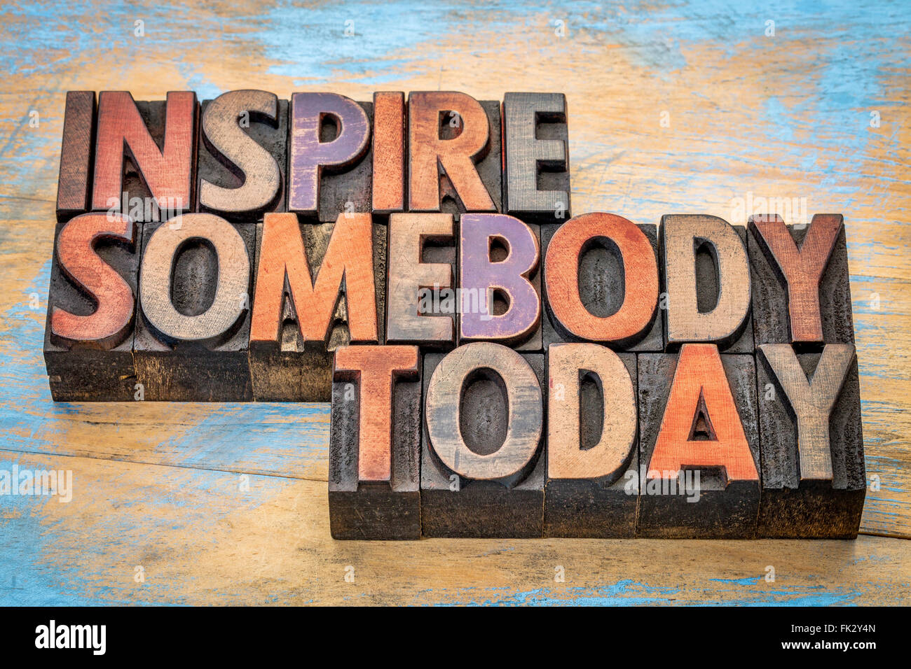 inspire somebody today - motivational text in vintage letterpress wood type Stock Photo