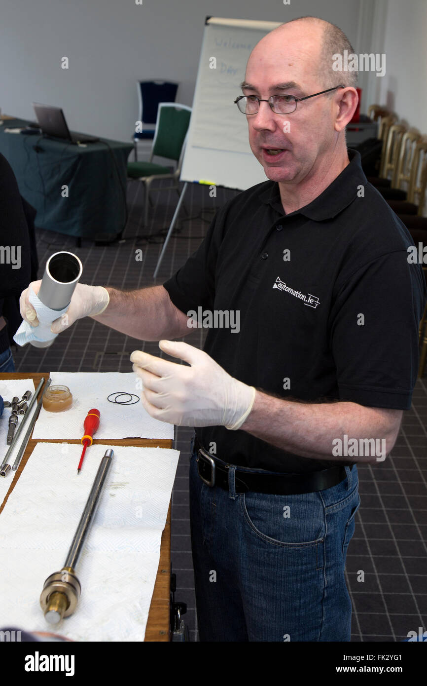 Engineering instructor with equipment in classroom. Stock Photo