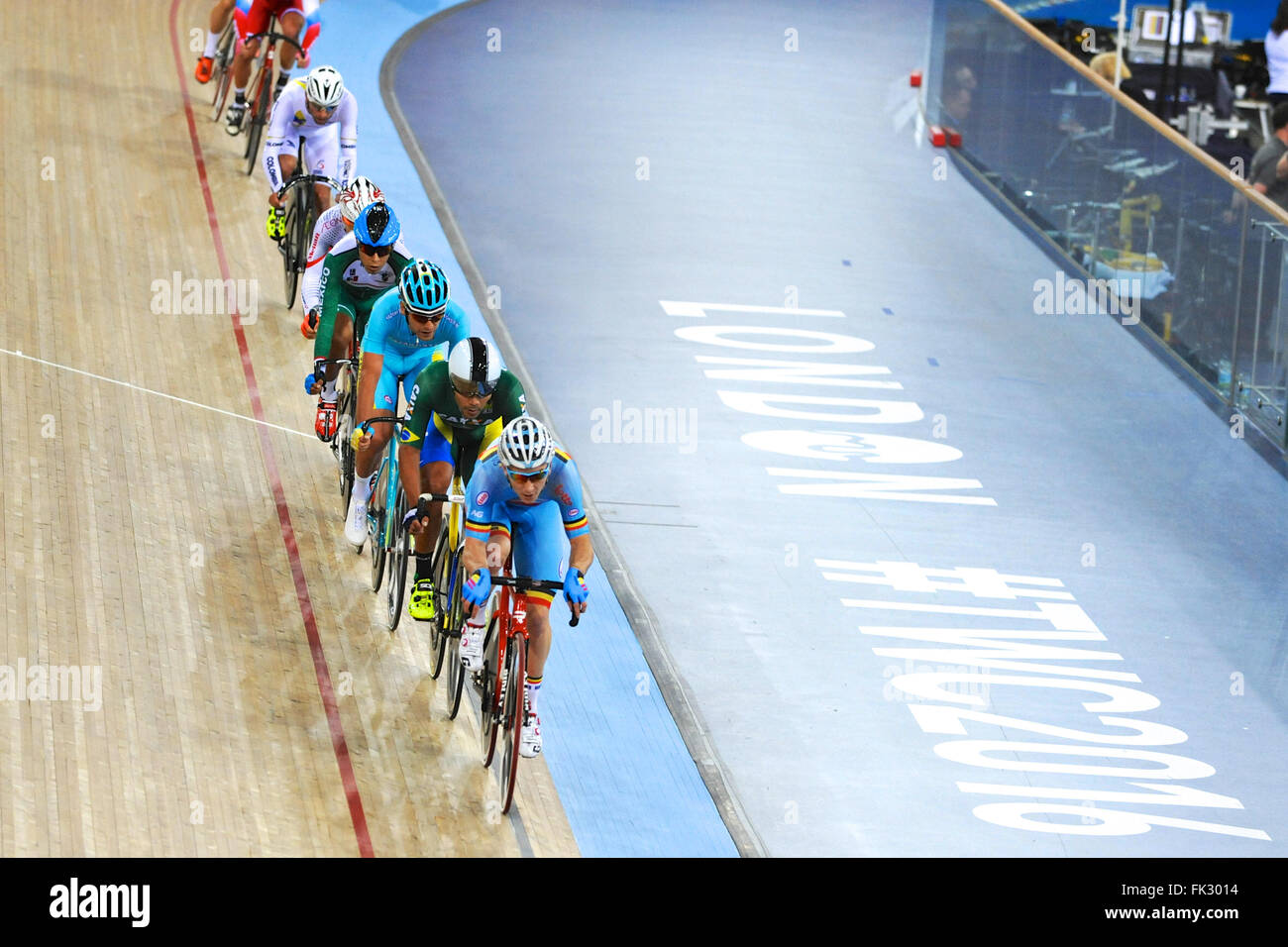 London, UK. 05th Mar, 2016. A stretched out peleton, being led by Jasper De Buyst (BEL) during the Men's Omnium Final at the UCI 2016 Track Cycling World Championships, Lee Valley Velo Park. Riders behind the leader are: Gideoni Monteiro (BRA), Artyom Zakharov (KAZ), Ignacio Prado (MEX), Sang-Hoon Park (KOR) and Fernando Gaviria Rendon (COL). Credit:  Michael Preston/Alamy Live News Stock Photo