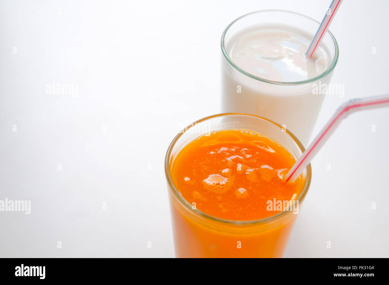 Mango juice and milk shake. Close view Stock Photo Alamy