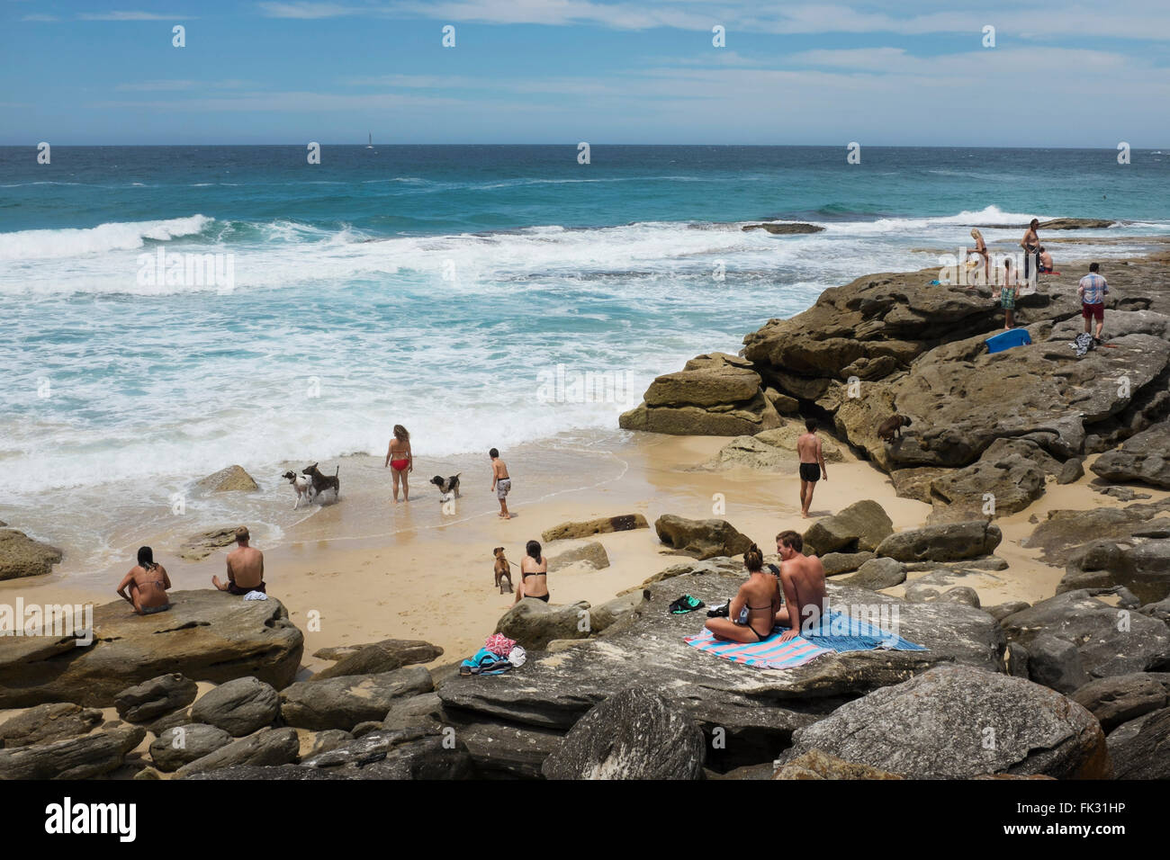 people in a cove along the Coogee to Bondi coastal walk, Sydney, NSW, Australia Stock Photo