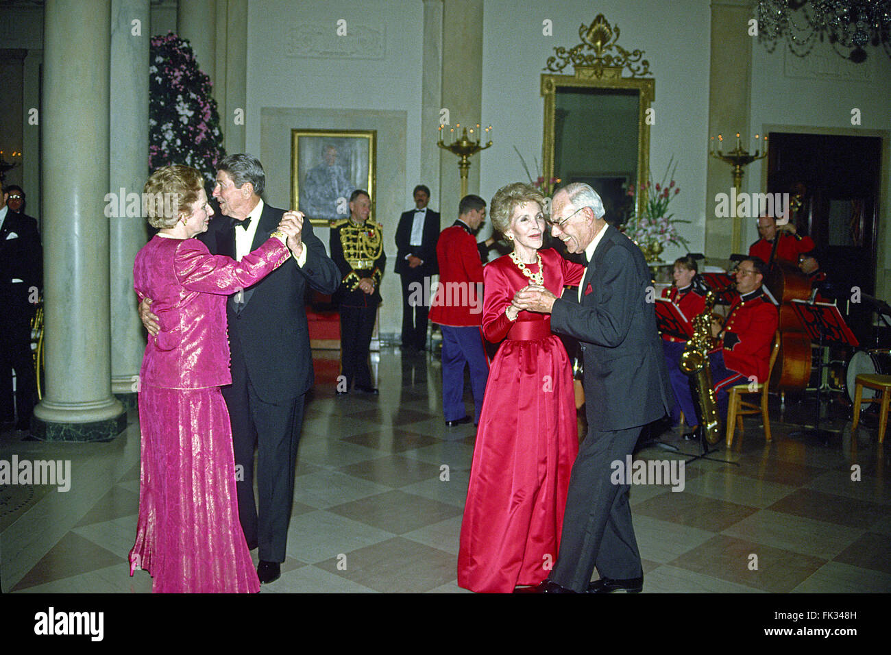 Washington, District of Columbia, USA. 4th Mar, 2008. United States President Ronald Reagan and Prime Minister Margaret Thatcher of Great Britain share a dance in the Entrance Hall of the the White House in Washington, DC following the dinner in her honor on Wednesday, November 16, 1988. At right their spouses, first lady Nancy Reagan and Denis Thatcher share a dance as well. Thatcher died from a stroke at 87 on Monday, April 8, 2013.Credit: Ron Sachs/CNP © Ron Sachs/CNP/ZUMA Wire/Alamy Live News Stock Photo