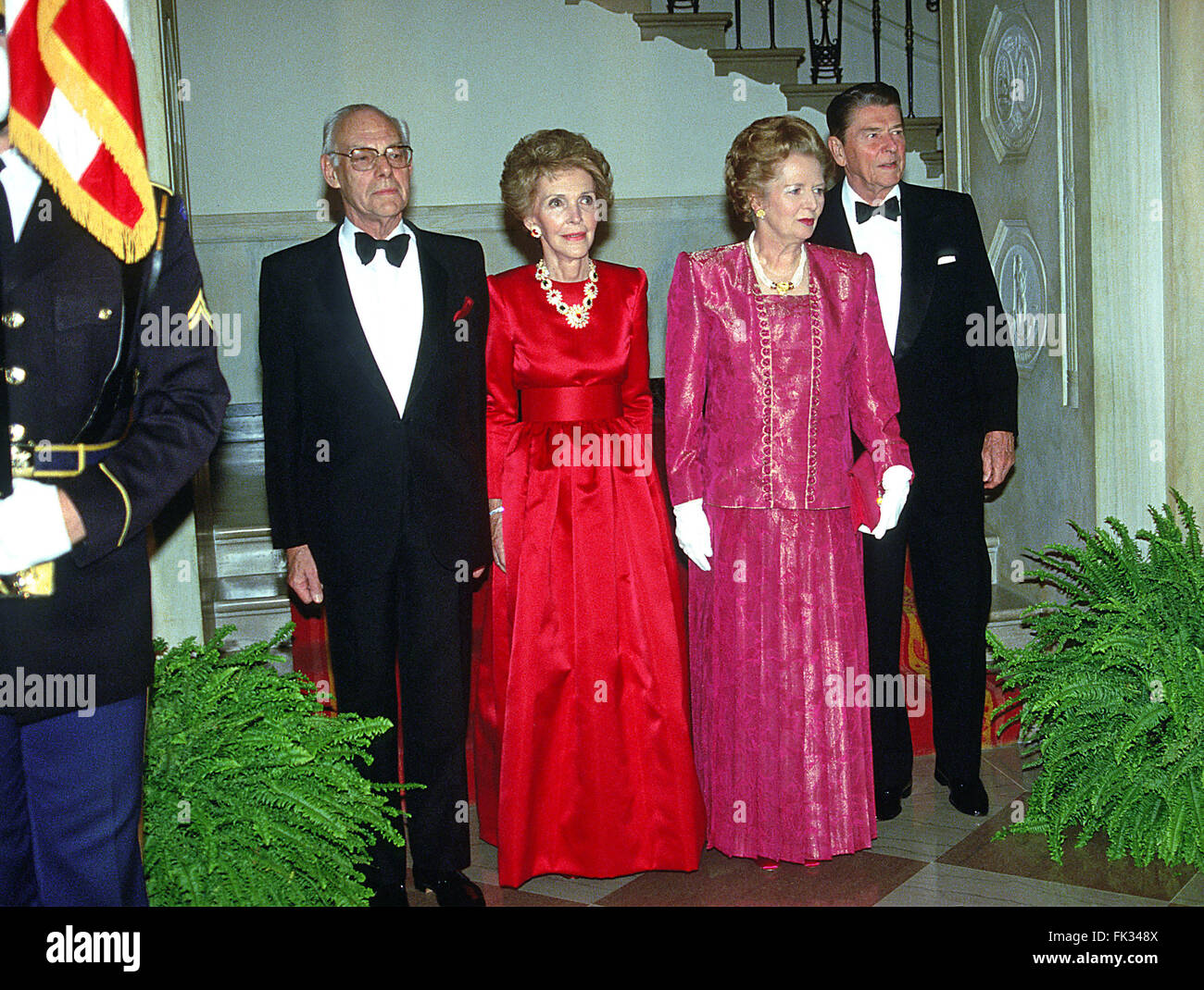 Washington, District of Columbia, USA. 4th Mar, 2008. Denis Thatcher, first lady Nancy Reagan, Prime Minister Margaret Thatcher of Great Britain, and United States President Ronald Reagan pose for the ''Grand Staircase'' photo at the White House in Washington, DC prior the dinner in the Prime Minister's honor on Wednesday, November 16, 1988. Thatcher died from a stroke at 87 on Monday, April 8, 2013.Credit: Ron Sachs/CNP © Ron Sachs/CNP/ZUMA Wire/Alamy Live News Stock Photo