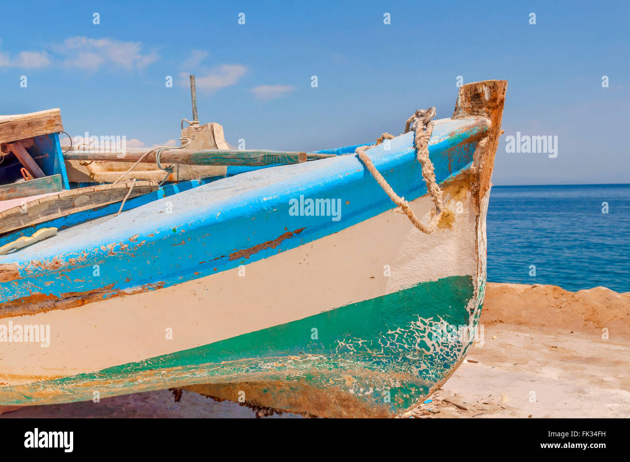Old blue metal shabby fishing boat Stock Photo - Alamy