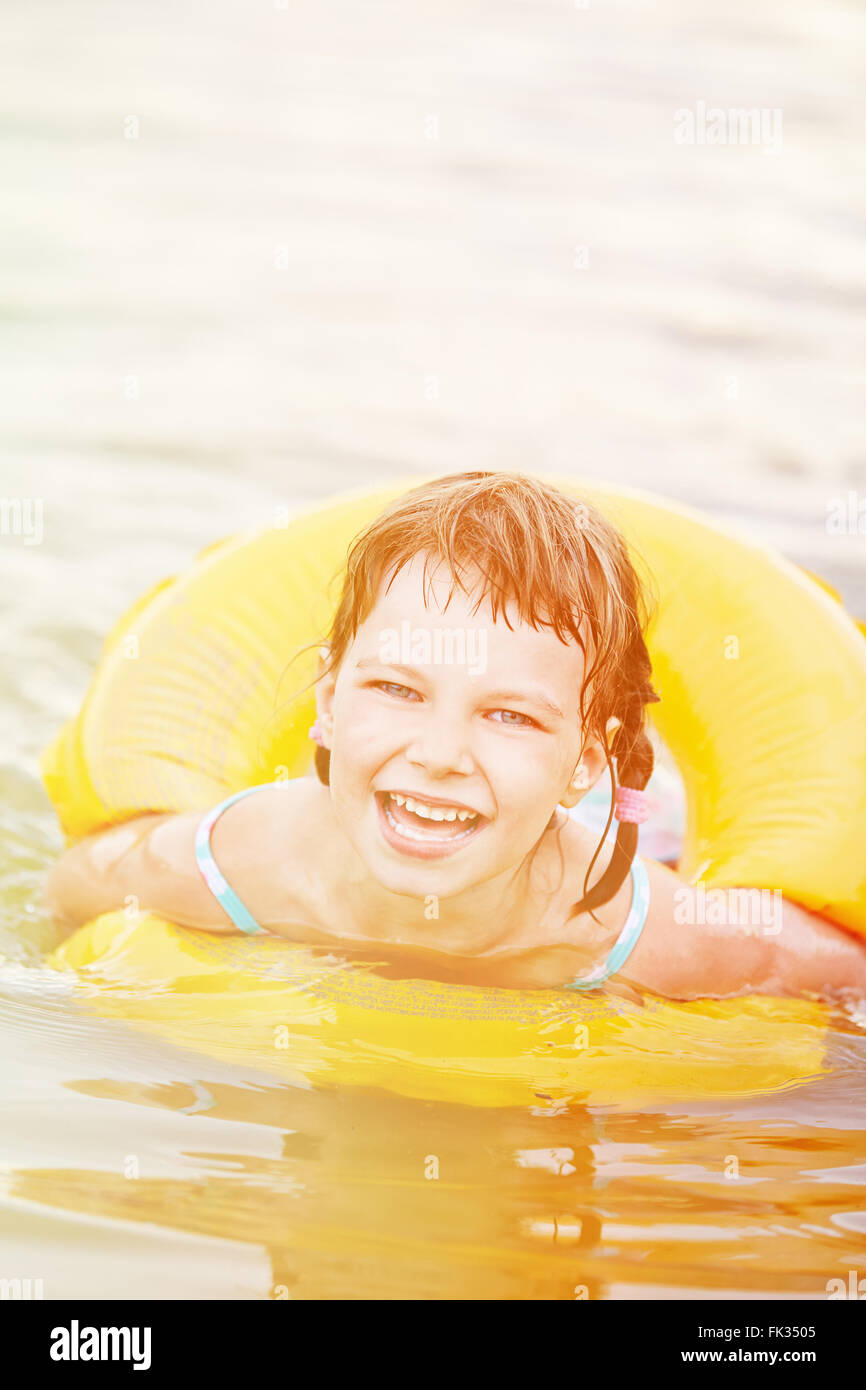 Girl floating in water hires stock photography and images Alamy
