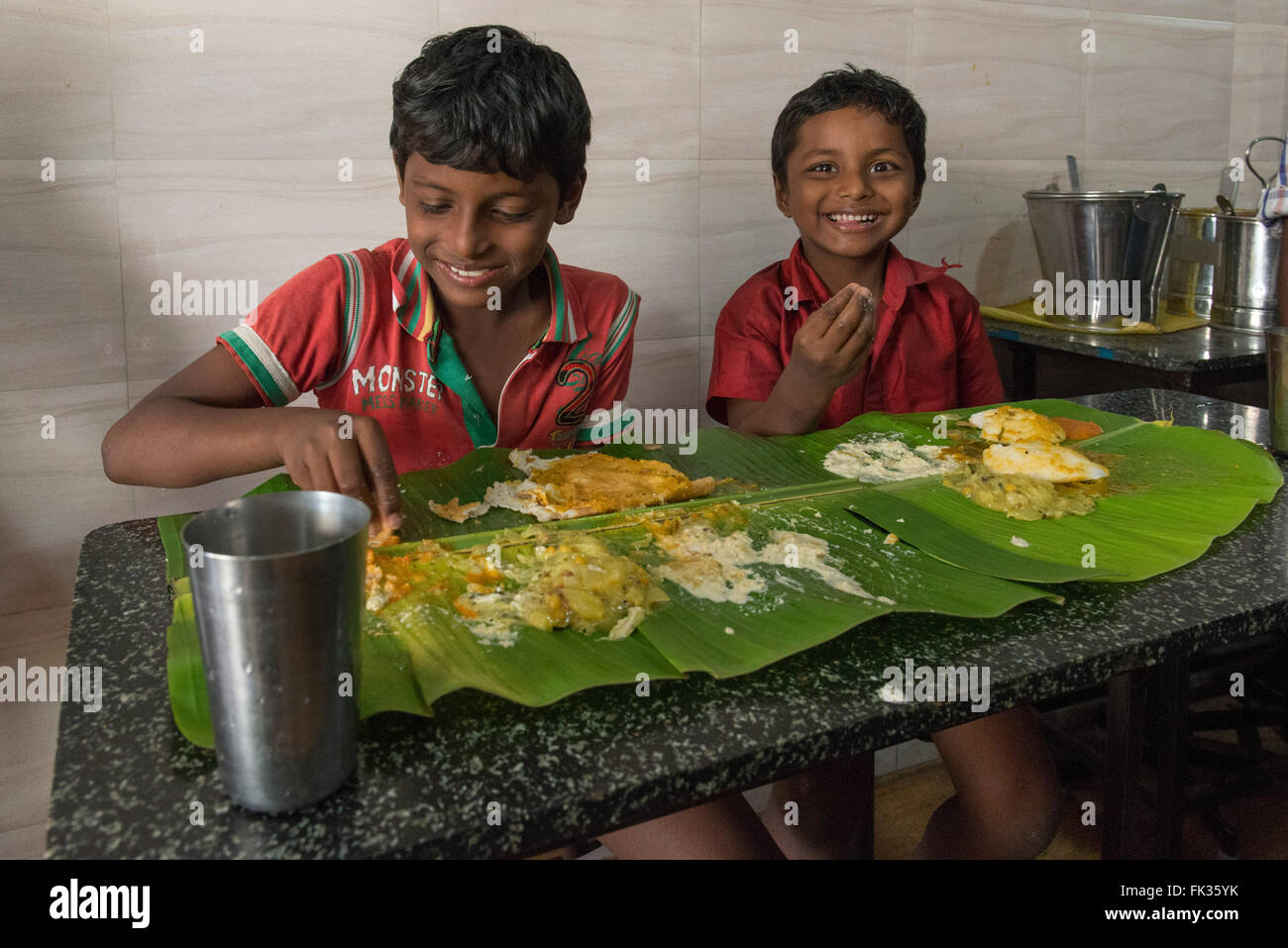 Two Boys Having Lunch In A Restaurant, Srirangam, Tiruchirappalli Stock Photo