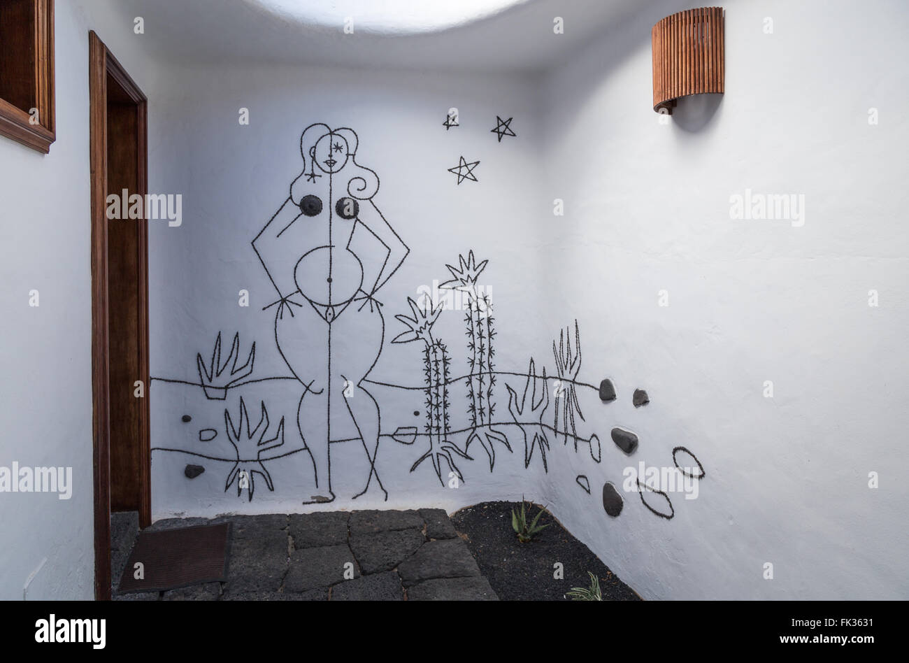 Artwork by César Manrique at the entrance to the Women's toilet at the Lanzarote Cactus Garden. Stock Photo