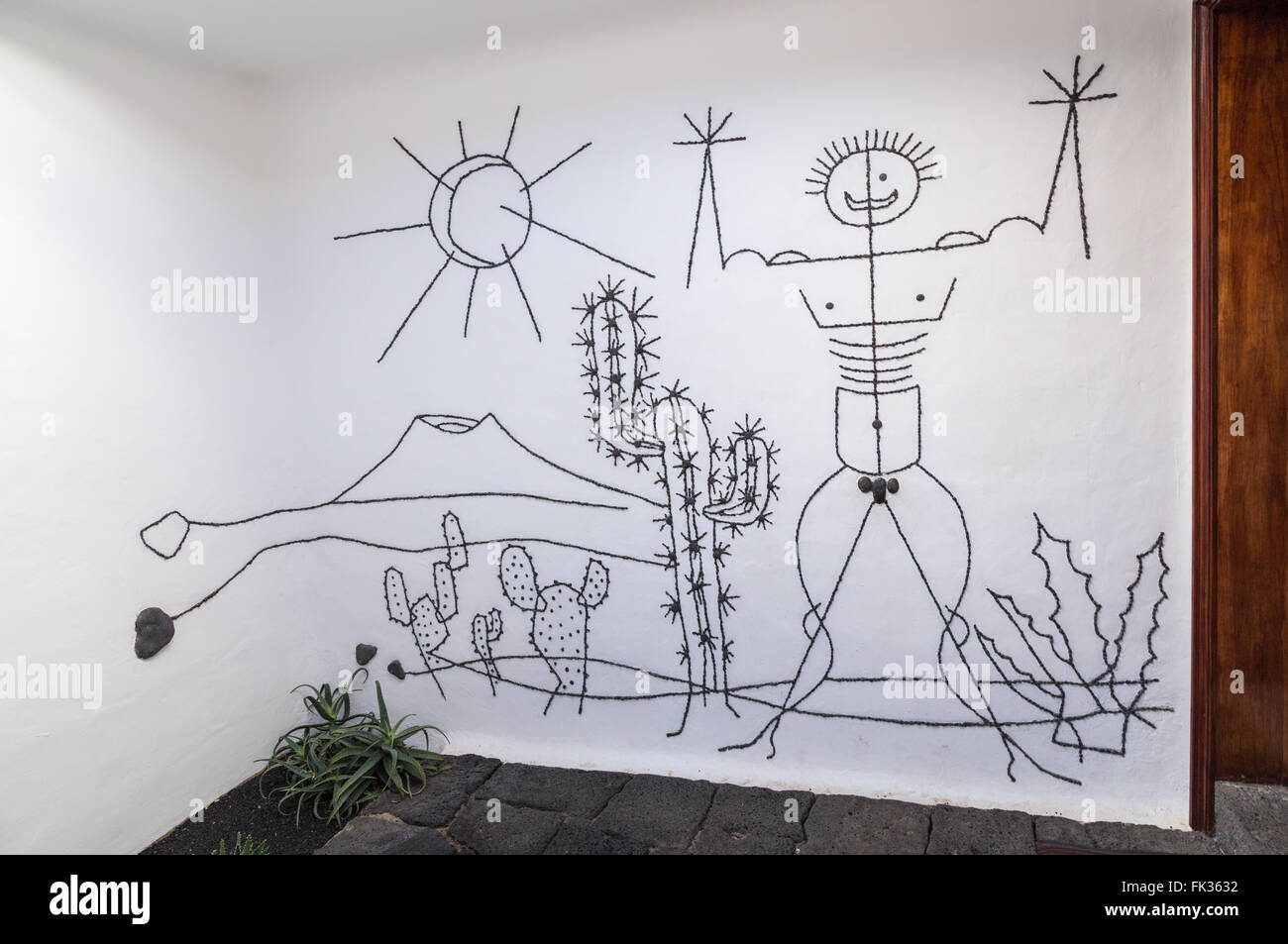 Artwork by César Manrique at the entrance to the men's toilet at the Lanzarote Cactus Garden. Stock Photo