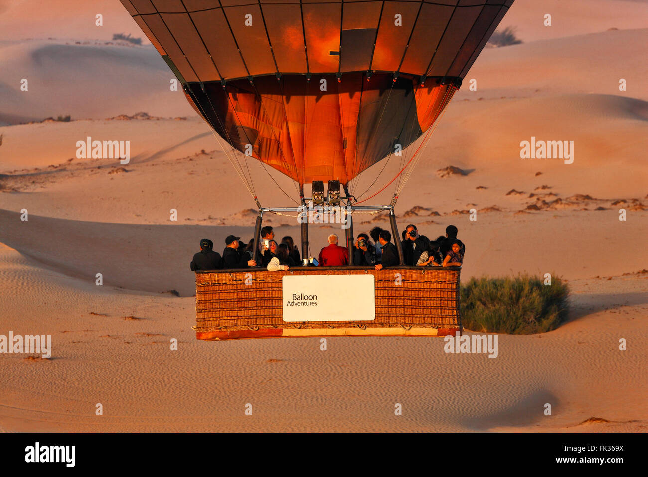 Fly with hot air balloon over Dubai desert Stock Photo