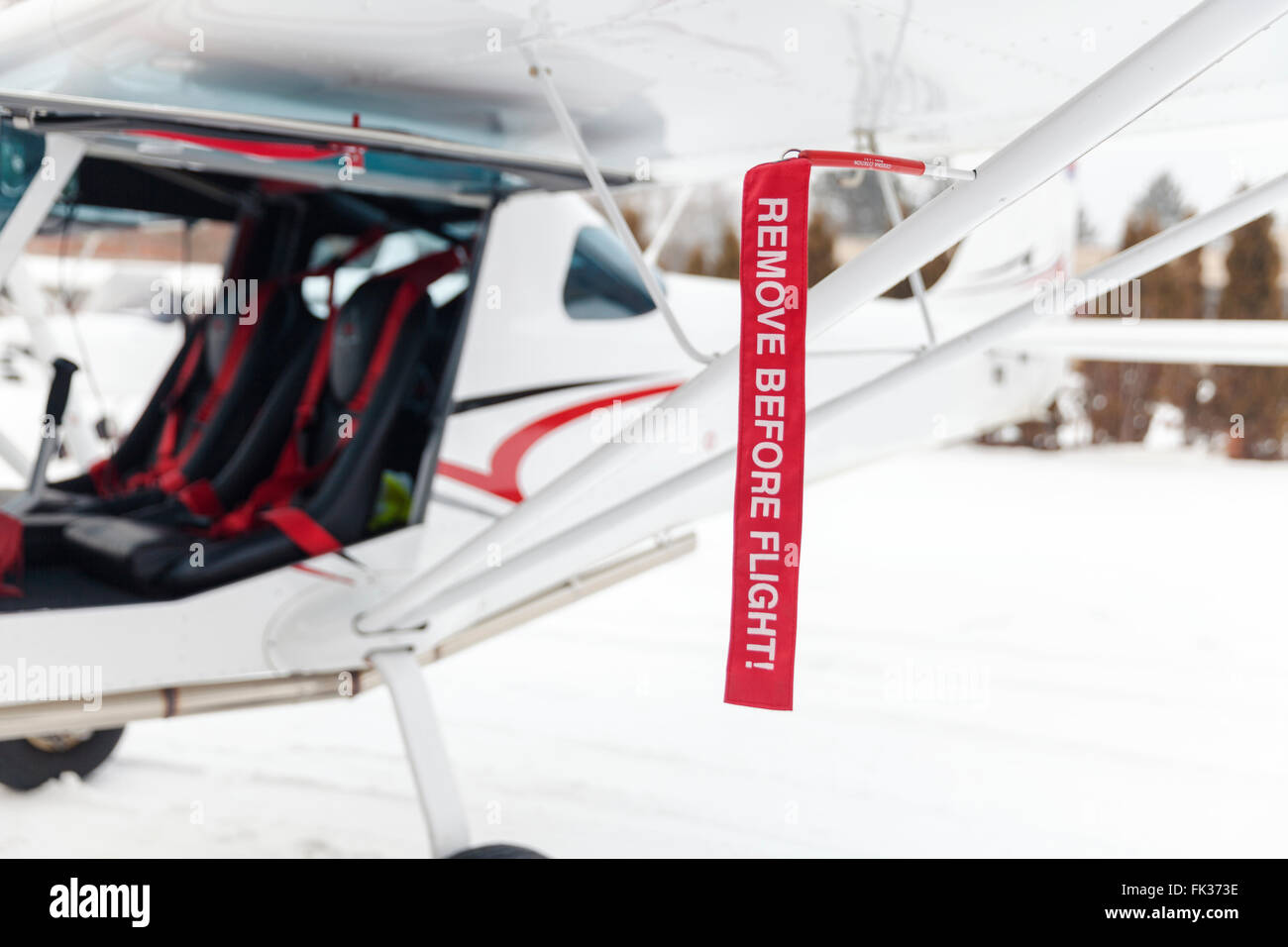 remove before flight, on small airplane close up Stock Photo