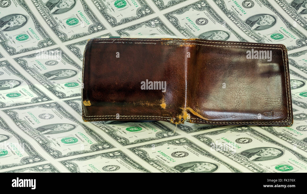 old warn wallet on a sheet of two dollar bills stock photo 97801842 sheet of two dollar bills
