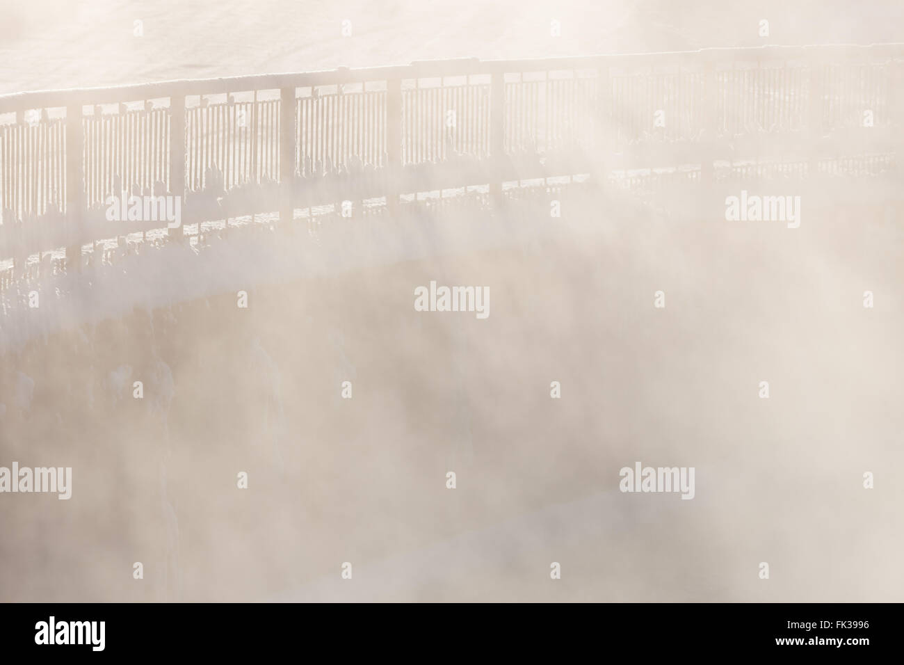 Railing in morning fog Stock Photo