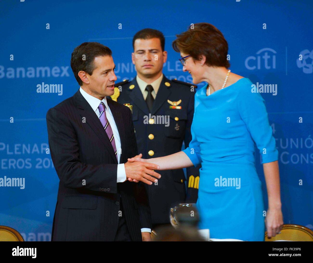 Mexican President Enrique Pena Nieto greets Jane Fraser, CEO of CITI Bank Latin America at the annual meeting of the Board of Directors of Banco Nacional de Mexico known as Banamex Bank at the Hyatt Hotel March 6, 2016 in Mexico City, Mexico. Banamex is owned by Citigroup. Stock Photo